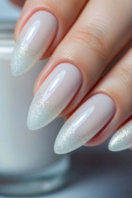 Pearl-White Almond Nails for a Frosty Finish