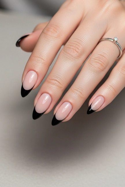Classic Black French Tips on Almond Nails