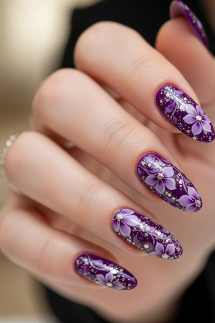 Glittery Violet Floral Nails for a Touch of Sparkle