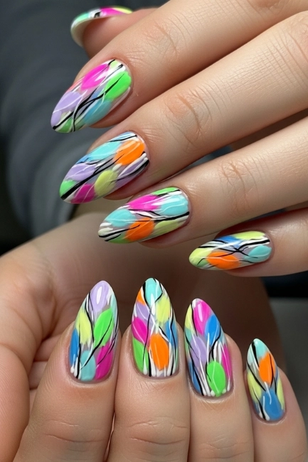 Abstract Color Splash Patterns That Make Whimsical Nails Look Bold and Artistic