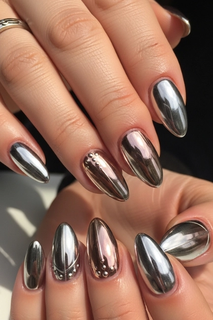 Incorporating Subtle Nail Art Patterns with Chrome Tips for Added Detail